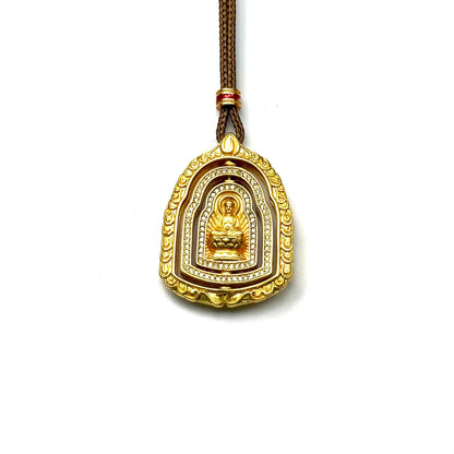 A front view of an authentic sand gold 3d spinning Buddha pendant featuring a multi-layer rotating shrine and micro-pave rhinestone crystals on a white background.