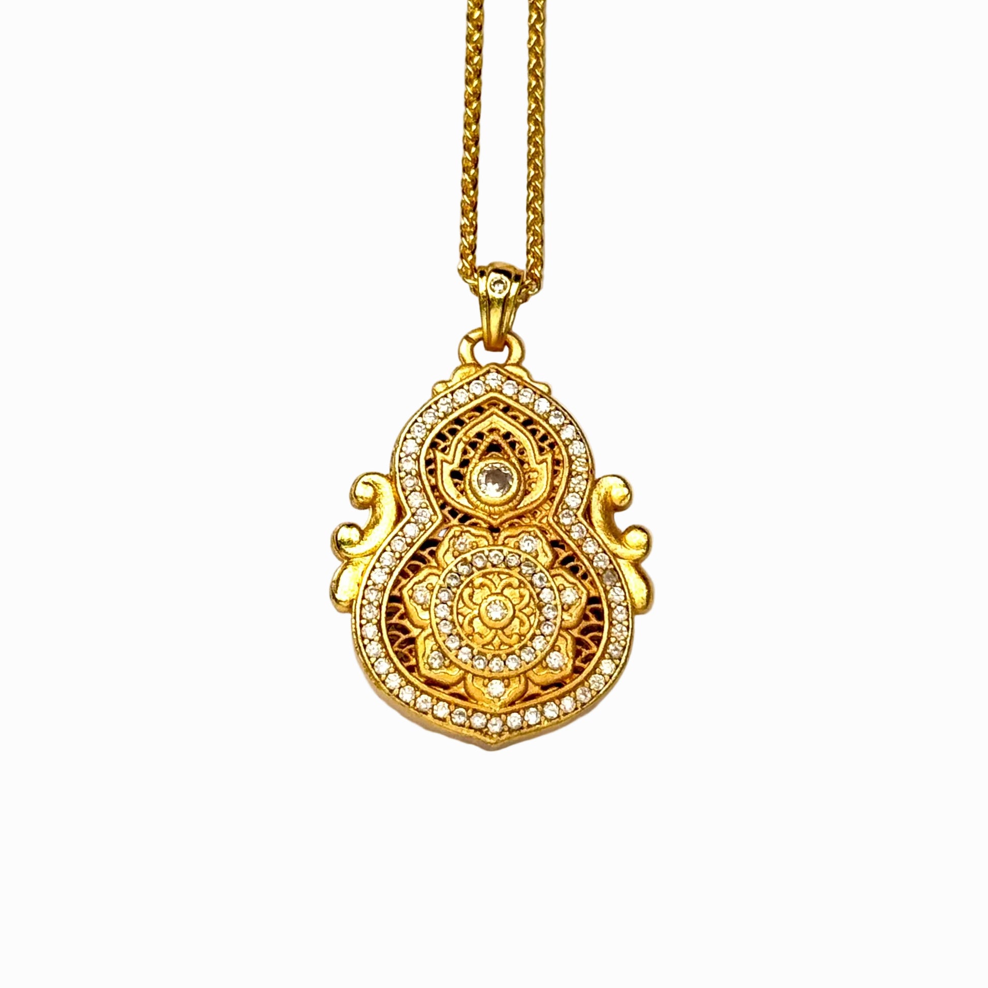 A crisp front view of an authentic sand gold Hulu gourd pendant with Ruyi cloud ears, featuring an intricate openwork filigree backdrop, sacred lotus mandala, and a brilliant diamond rhinestone border on a white background.