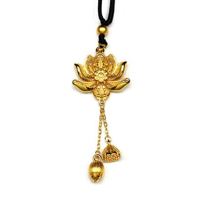 An elegant sand gold filigree lotus pendant with dangling lotus pod tassels on a black cord, displayed against a pure white background.