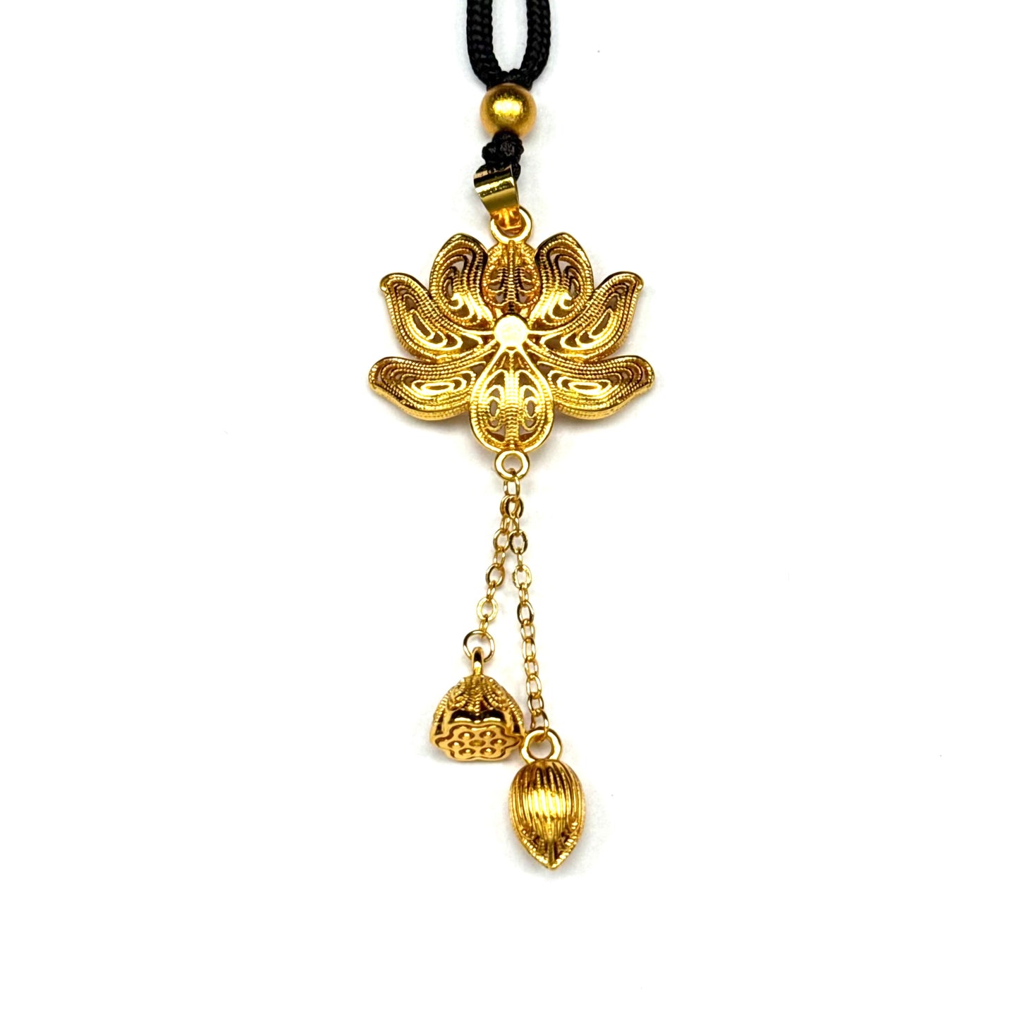 An elegant sand gold filigree lotus pendant with dangling lotus pod tassels on a black cord, displayed against a pure white background.