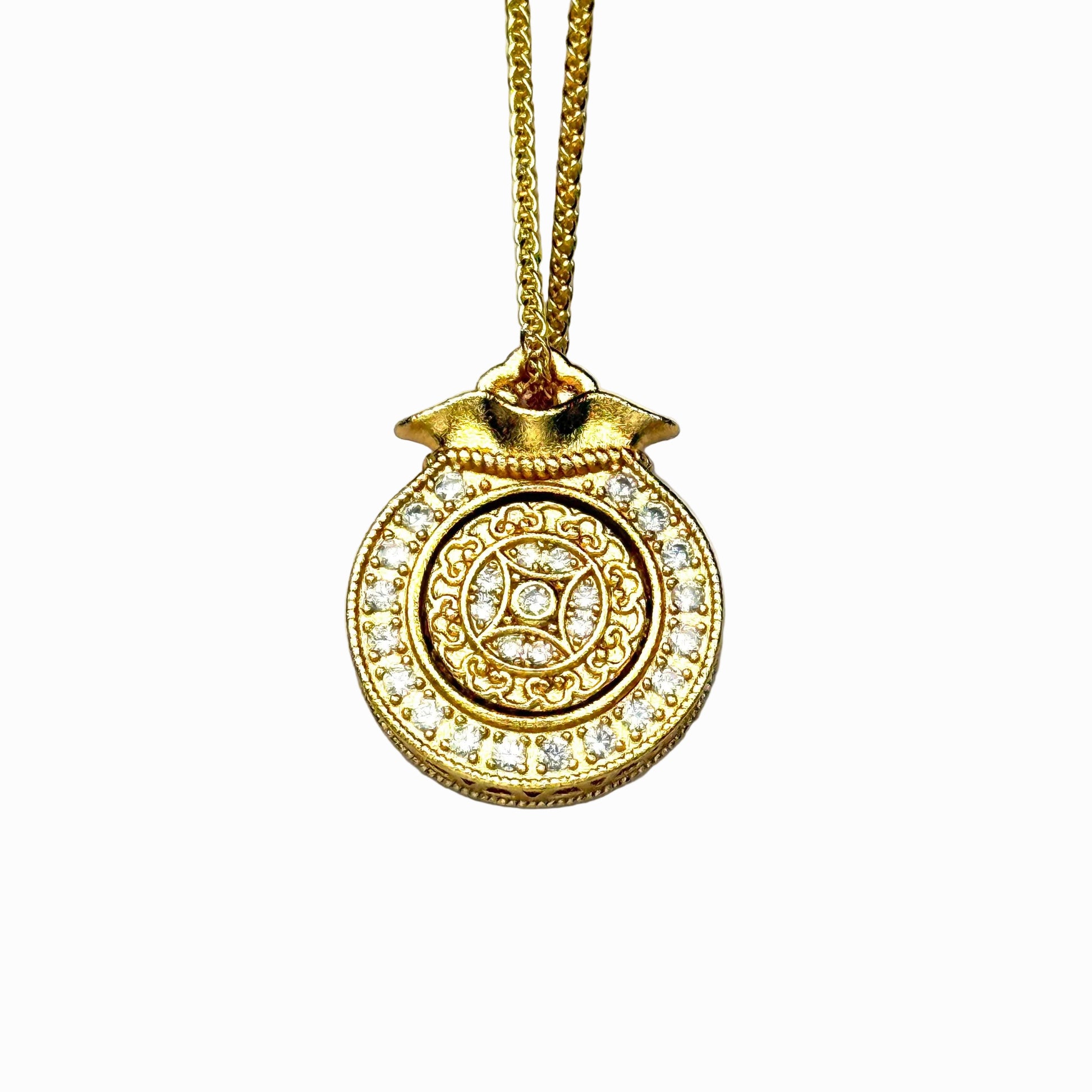 A front view of an authentic sand gold money bag pendant featuring a central ancient fortune coin motif and a brilliant double-row rhinestone border on a white background.