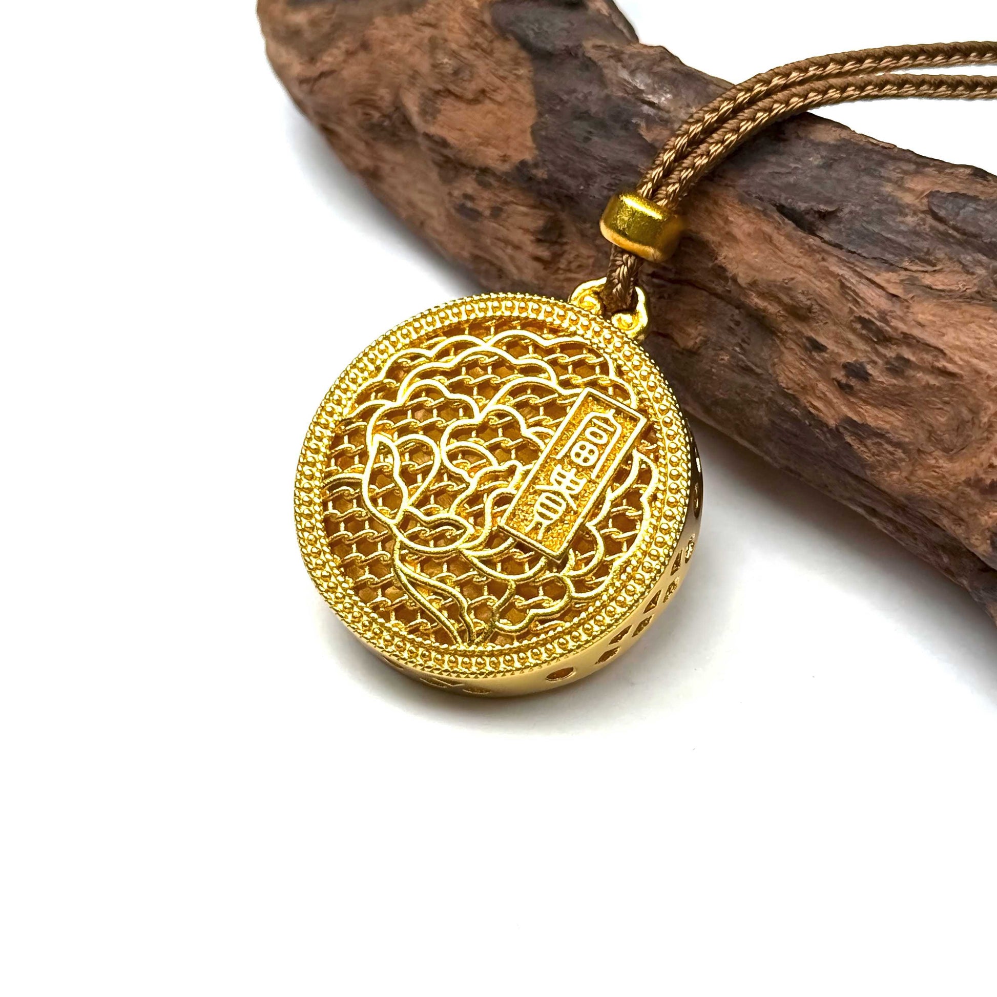 A luxurious 3D sand gold peony floral wealth talisman resting on rustic driftwood, highlighting its deep golden luster and detailed petal relief.