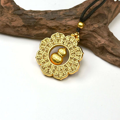 A regal sand gold kinetic fortune wheel amulet with a 3D rotating gourd center, displayed elegantly against a rustic driftwood branch for a Zen look.